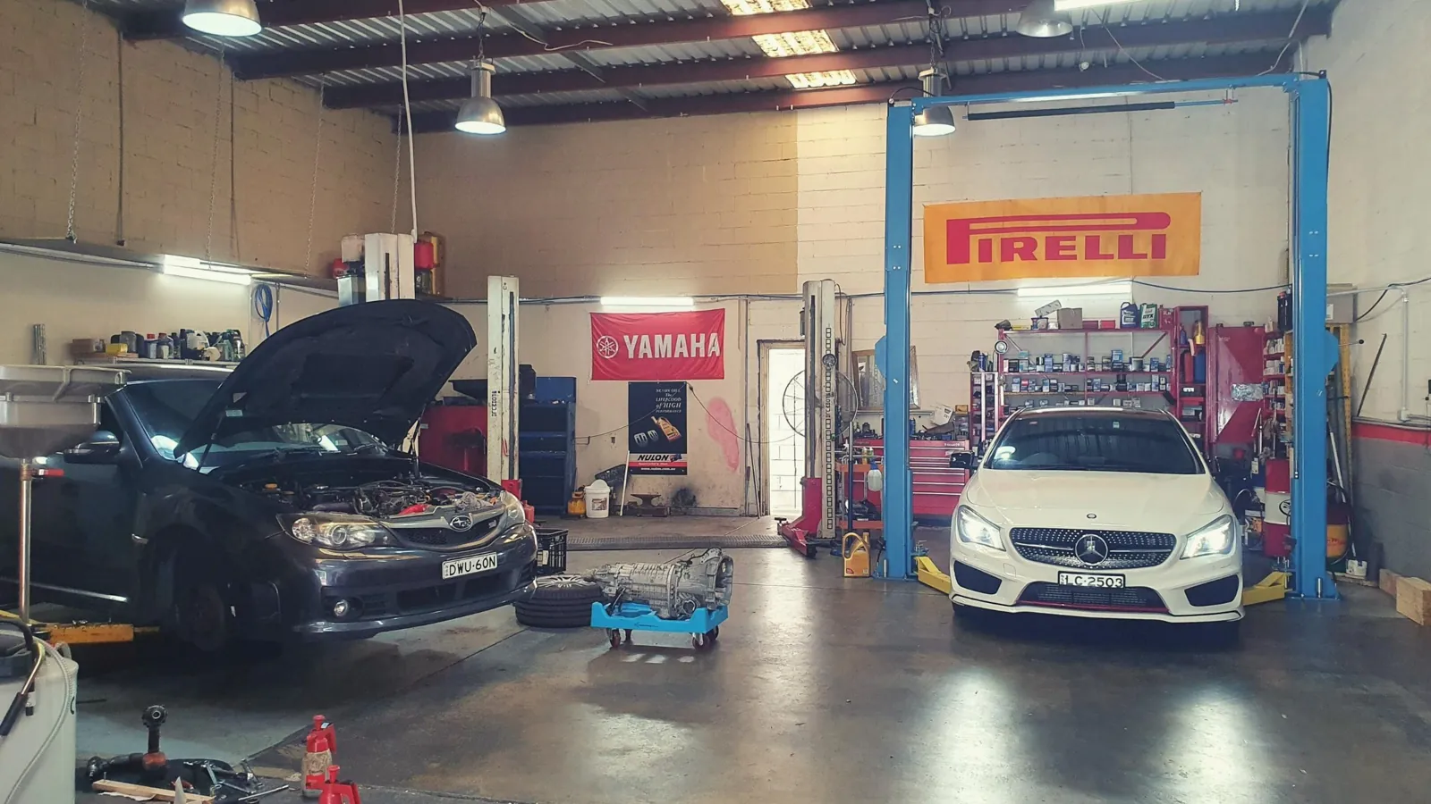 Vehicles inside the Thornleigh Motor Repairs workshop
